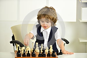 Quarantine Games. Chess. Boy and a chessboard.