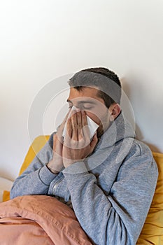 Quarantine oubreak Coronavirus. Sick man of corona virus lying down in bed wearing mask protection mask and recovery from home