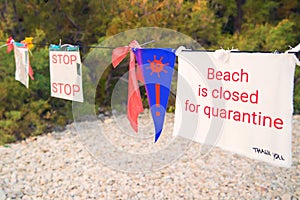 Quarantine sign on beach