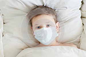 Quarantined medical masked child. Covid Epidemic concept