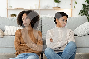 Quarrel of friends, problems and resentment. Angry and mad two millennial african american ladies