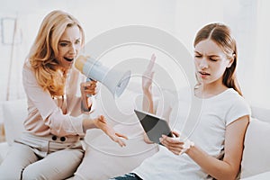 Quarrel between Mother and Daughter in White Room