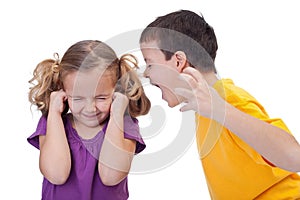 Quarreling kids - boy shouting to girl