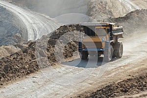 Quarry dumptruck working in a coal mine
