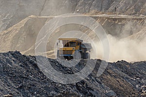 Quarry dumptruck working in a coal mine