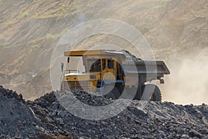 Quarry dumptruck working in a coal mine