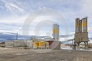 Quarry for the extraction of sand and stone, its transformation into gravel and cement manufacturing