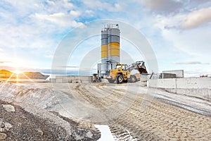 Quarry for the extraction of sand and stone, its transformation into gravel and cement manufacturing