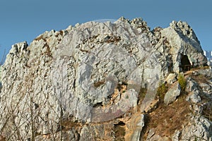 Quarry rocks on hill.