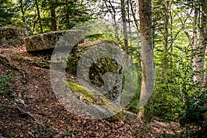 Abandoned grinding stone quarry in the Vercors, France photo