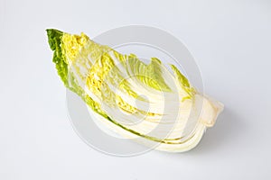 a quarter of Chinese cabbage cut isolated on white background