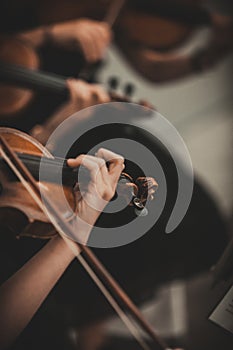 Quartet violin and cellos - closeup on hands - female hands