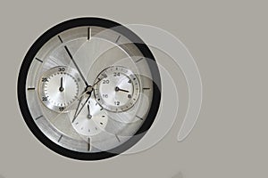 Quartz clock with chronograph on grey background