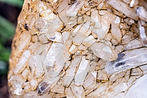 Quartz mine, detail of raw crystals on the wall of a mine, concept of precise stone being mined