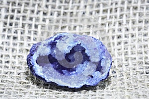 Quartz with mineral crystals against a black background