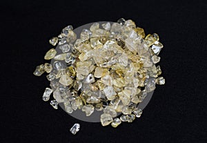 Quartz with rutile yellow, freeform stone background