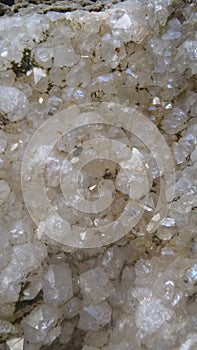 quartz stone on the wall inside an ancient cave