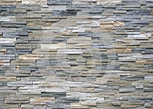 Quartzite natural stone cladding for external walls. Background and texture photo