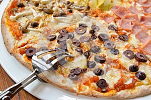 Quattro stagioni pizza photo