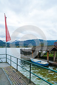 Quay on Lake Wolfgangnear St. Wolfgang town and Schafberg Alps,