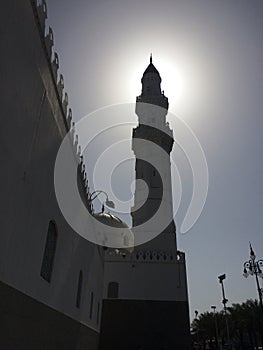 Silhouette image of Pillar of Quba Mosque in Medina - Creating Halo effect - Islamic sacred city of Al Madinah - Religious tour photo