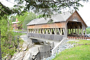 Quechee covered bridge in Canada with water below