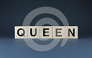 Queen. Cubes form the word Queen