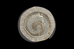 Queen Elizabeth II on obverse of the Great Britain twenty pence coin of 2004, isolated on a black background