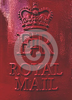 Queen Elizabeth ll emblem and crown on a Royal Mail red postbox