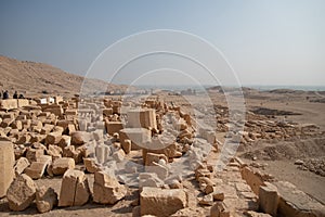 Queen Hatshepsut mortuary temple and the red cliffs of the western bank of the Nile river