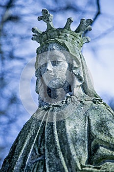 Queen of Heaven. Ancient statue of the Virgin Mary. Christianity, religion, faith, God concept