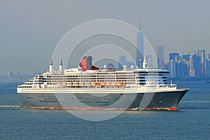 Queen Mary 2 cruise ship in New York Harbor heading for Canada and New England