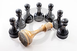 queen and pawn. falling old dictator surrounded by young generation - youth bulge above old formations - regime change chess