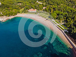 Queen's Beach in Milocer, Montenegro. Aerial view of sea waves and fantastic Rocky coast, Montenegro