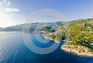 Queen's Beach in Milocer, Montenegro. Aerial view of sea waves and fantastic Rocky coast, Montenegro. drone