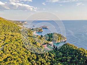 Queen's Beach in Milocer, Montenegro. Aerial view of sea waves and fantastic Rocky coast, Montenegro. drone