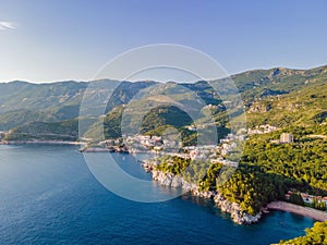 Queen's Beach in Milocer, Montenegro. Aerial view of sea waves and fantastic Rocky coast, Montenegro. drone