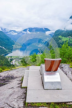 Queen Sony Chair on the Flydalsjuvet Viewpoint. The Geiranger village and Geirangerfjord landscape. Norway