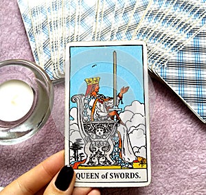 Queen of Swords Tarot Card Honesty Truth Principles Standards Clinical Sterile Reserved Detached Aloof Cool Private Sever photo