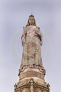 Queen Victoria on top of Doulton Fountain, Glasgow Scotland UK.