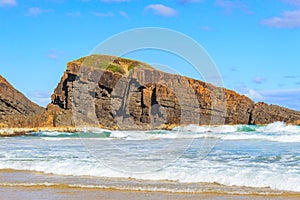 Queens Head Lookout, Australian coastline with rocks on the seafront, view from the sandy beach to the seaside landscape on a