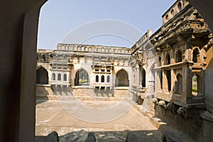 Queens`s bath, Interior pillared corridors and projecting balconies, Hampi, Karnataka India.