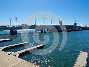 The Queens Wharf with the view of Birkenhead Bridge across port Adelaide river in blue sky day.