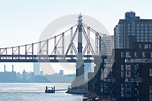 The Queensboro Bridge over the East River with Skyscrapers on Roosevelt Island in New York City