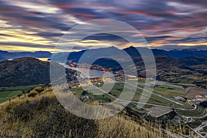 Scenic view of Queenstown City and Airport at Sunset, New Zealand