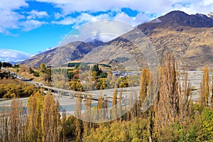 Queenstown, New Zealand. The bridge over the Shotover River in autumn