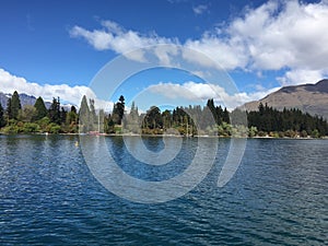 Queenstown Waterfront turquoise crystal clear water on sunny day