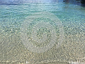 Queenstown Waterfront turquoise crystal clear water on sunny day