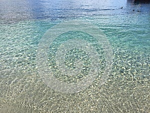 Queenstown Waterfront turquoise crystal clear water on sunny day