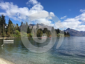 Queenstown Waterfront turquoise crystal clear water on sunny day